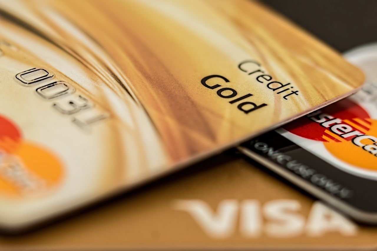Close-up of gold Visa and Mastercard credit cards